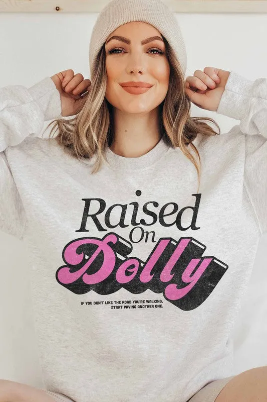 RAISED ON DOLLY GRAPHIC SWEATSHIRT