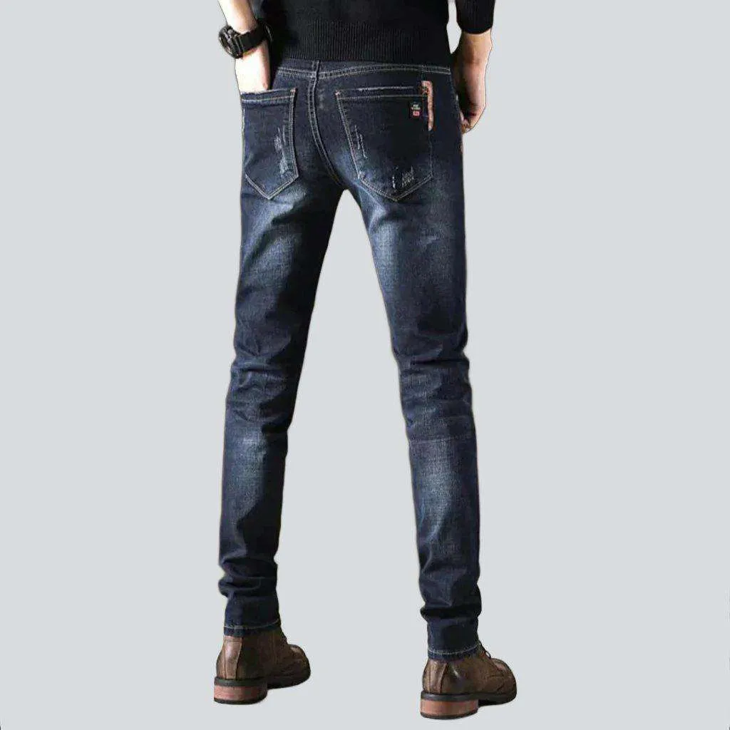 Whiskered skinny men's jeans